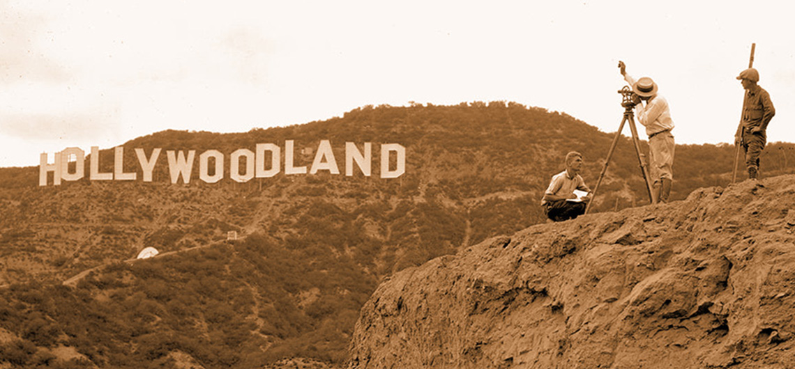 Woman looking at smartphone on summer evening